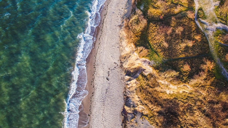 Aerial view of California coastline and clear blue water
